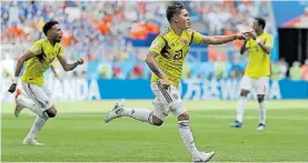  ?? AP ?? Figura. Quintero grita su gol de tiro libre a Japón. Sería derrota 1-2.