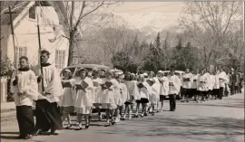  ?? Photograph­er unknown ?? Here is a picture of St. Timothy’s processing from the mortuary to the new building site circa 1950.