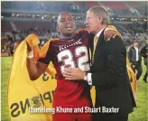  ??  ?? Itumeleng Khune and Stuart Baxter