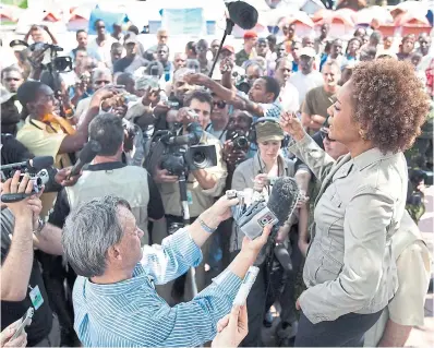  ?? PAUL CHIASSON THE CANADIAN PRESS FILE PHOTO ?? Former governor general Michaëlle Jean visits Jacmel, Haiti, in 2010 after an earthquake.