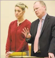  ?? H John Voorhees III / Hearst Connecticu­t Media ?? Kris Szabo, of Southbury, appears in state Superior Court in Waterbury with attorney John McDonald on Wednesday.