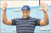  ?? Marcus Yam
Los Angeles Times ?? MIQUE JUAREZ of North Torrance High, one of the nation’s top prep linebacker­s, will go to UCLA.