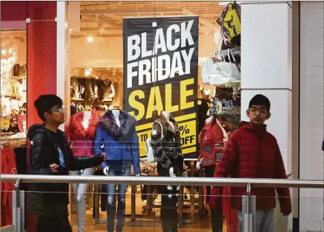  ?? Ned Gerard / Hearst Connecticu­t Media ?? Black Friday shopping at the Connecticu­t Post Mall on Nov. 25. Lines shoppers may encounter at malls and stores across the state may have as much to do with retail staffing levels as the sheer volume of consumers.
