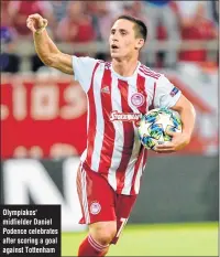  ??  ?? Olympiakos' midfielder Daniel Podence celebrates after scoring a goal against Tottenham