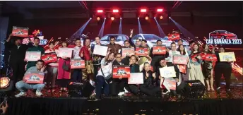  ?? ?? RedOne sales partners with their prizes worth over RM 1.5 million presented during the gala.