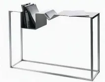  ?? MAISONCORB­EIL.COM ?? The Zigzag Console offers up slim and stylish storage for mail, keys and a laptop while boasting a narrow, 12-inch depth. $456