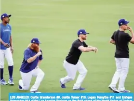  ??  ?? LOS ANGELES: Curtis Granderson #6, Justin Turner #10, Logan Forsythe #11 and Enrique Hernandez #14 of the Los Angeles Dodgers on the field ahead of the World Series at Dodger Stadium in Los Angeles.— AFP