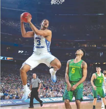  ??  ?? Kennedy Meeks came up huge for the Tar Heels with 25 points on 11- for- 13 shooting and 14 rebounds. | TOM PENNINGTON/ GETTY IMAGES