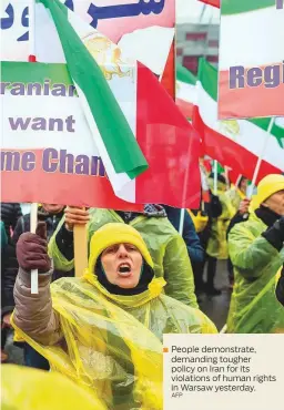  ?? AFP ?? People demonstrat­e, demanding tougher policy on Iran for its violations of human rights in Warsaw yesterday.