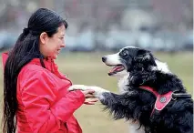  ?? ?? Researcher Laura V Cuaya talks to her dog Kun-kun (Reuters)