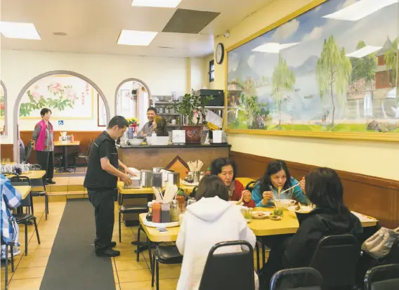  ?? Jen Fedrizzi / Special to The Chronicle ?? Hai Ky Mi Gia on Ellis Street in S.F. is just one spot that serves Teochew food from southeaste­rn China: wide rice noodles in a light, fishy broth with pork.