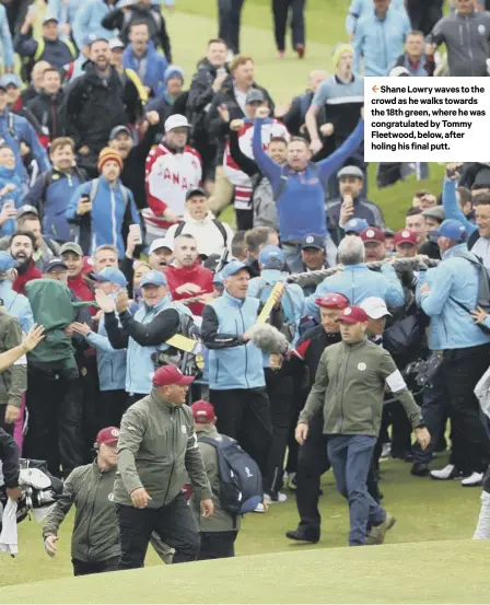  ??  ?? 2 Shane Lowry waves to the crowd as he walks towards the 18th green, where he was congratula­ted by Tommy Fleetwood, below, after holing his final putt.