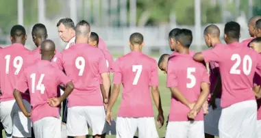  ?? ARMAND HOUGH ?? GRAND STAGE: Club owner George Dearnaley, in white top, helps prepare members of The Magic FC team during practice in Pinelands this week ahead of their Nedbank Cup tie against Platinum Stars