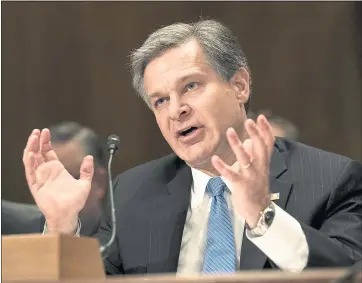  ?? ALEX BRANDON — THE ASSOCIATED PRESS ?? FBI Director Christophe­r A. Wray testifies before the Senate Committee on Homeland Security and Government­al Affairs.