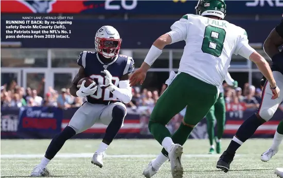  ?? NANCY LANE / HERALD STAFF FILE ?? RUNNING IT BACK: By re-signing safety Devin McCourty (left), the Patriots kept the NFL’s No. 1 pass defense from 2019 intact.