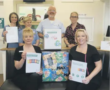  ?? SUZANNE LIANO ?? The team at Tangmere Dental Care with its recycling boxes