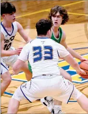  ?? PILOT PHOTO/BEV HARAMIA ?? Bremen’s Camden Hickman is double-teamed by Triton’s Julian Swanson (10) and Anthony Schuh (33).