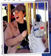  ?? MEGA Picture: ?? H Horsing i around: d Olivia Oli iC Colman l relaxes at Disneyland on Friday