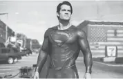  ?? CLAY ENOS, WARNER BROS., VIA AP ?? Henry Cavill leapt into the role of Superman in a highly lucrative single bound.