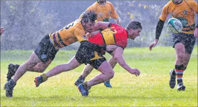  ?? Photo: Iain Ferguson, The Write Image ?? Callum Boyd and his team-mates battled through bouts of torrential rain during Saturday’s match.