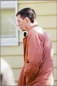  ?? Christian Abraham / Hearst Connecticu­t Media ?? Actor Eddie Redmayne leaves the home in Stamford used as a set for the Netflix movie, “The Good Nurse.”