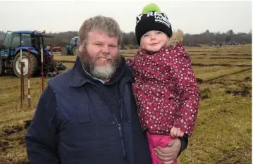  ?? PHOTO: DENIS BOYLE ?? Ger Hayes and his daughter Hannah at the ploughing match in Kilmeen, west Cork.