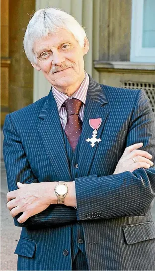  ?? GETTY ?? John Ashdown-Hill outside Buckingham Palace after being presented with an MBE by the Queen in 2015.