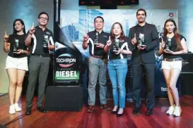  ??  ?? (2nd from left to right) CPI Finished Lubricants executives Roel Faustino, National Sales Manager; Manuel Valerio, Technical Manager; and Hafiz Nasar, Area Business Manager, launching the all-new Techron D Concentrat­e that maximizes fuel economy and...