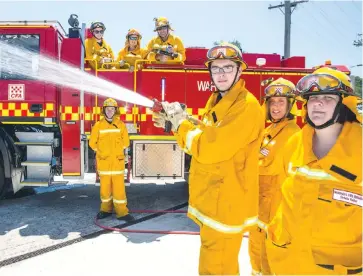  ??  ?? Ready to welcome new volunteers to Warragul CFA are, atop the tanker from left Dylan Wells, Belinda Hogan, Brian Brewer, standing Tim Moss and at front Alec Garcia, Lauren Brewer and Siobahn Walker.