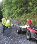  ??  ?? Maintenanc­e workers from the rural social scheme maintainin­g walkways in Sligo