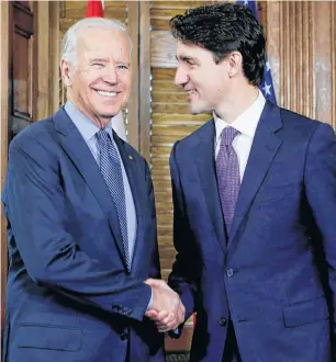  ?? REUTERS ?? Prime Minister Justin Trudeau (right) shakes hands with U.S. Vice President Joe Biden during a meeting in Trudeau’s office on Parliament Hill in Ottawa in December 2016.
