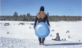  ?? MARK HENLE/THE REPUBLIC ?? Sledders and tubers will have a new option this winter now that Wing Mountain near Flagstaff will not open.