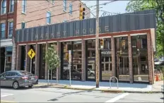  ?? Andrew Rush/Post-Gazette ?? A former Mellon Bank branch at 4112 Butler St. in Lawrencevi­lle will open as a cafe, restaurant and market house later this year.