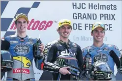  ??  ?? PODIO. Dos españoles, Álex Márquez y Mir, junto a Bagnaia, ganador.