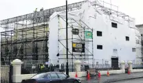  ?? PHOTO: DANIEL BIRCHFIELD ?? Unwrapped . . . Scaffoldin­g is coming down at the historic Oamaru courthouse in Thames St after six months of earthquake strengthen­ing and other work.