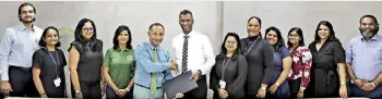  ?? ?? Teejay Lanka PLC CEO Pubudu De Silva and PLANT Chairman Sriyan de Silva Wijeyeratn­e exchange the agreement in the presence of representa­tives of the two organisati­ons