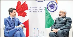  ?? (File Photo from Twitter) ?? Canadian Prime Minister Justin Trudeau meets with Indian Prime Minister Narendra Modi at the World Economic Forum.