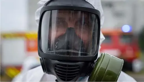  ?? ?? A Ukrainian emergency worker wearing a radiation protection suit participat­es in a training course in Zaporizhzh­ia, Ukraine, Thursday 29 June 2023