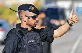  ?? Manu Fernandez / Associated Press ?? Regional police in Spain have confirmed that terror suspect Younes Abouyaaqou­b was shot dead Monday in Subirats, Spain. Police say he wore a fake suicide belt and had a bag of knives when police asked for his identifica­tion.