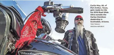  ?? TOM TINGLE/ ARIZONA REPUBLIC ?? Curtis May, 66, of Port Arthur, Texas, gets ready to ride his 2018 Road Glide Ultra outside the Harley-Davidson dealership in Scottsdale, Arizona.