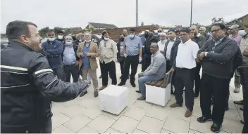  ??  ?? Taxi drivers outside Sand Martin House during th eplanning committee meeting on Tuesday.