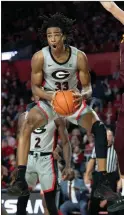  ?? / AP-John Amis ?? Georgia forward Nicolas Claxton reacts after grabbing a rebound against Arizona State forward Vitaliy Shibel, right, during the game in Athens, Ga., on Saturday.