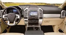  ??  ?? The Super Duty’s new instrument panel put controls in easier reach, with the 4x4 selector and integrated trailer brake controller mounted higher and oriented toward the driver.