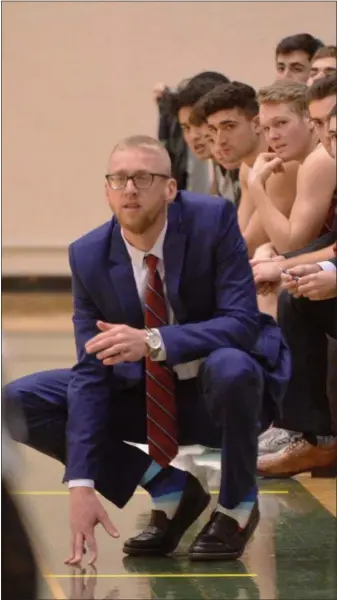  ?? STAN HUDY SHUDY@DIGITALFIR­STMEDIA.COM @STANHUDY ON TWITTER ?? Current Muhlenberg University coach Kevin Hopkins, a Saratoga alum and former head coach, watches Saturday’s action when his Mules faced Skidmore College.