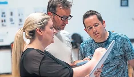  ??  ?? Above: Making some final tweaks to A-Z of Dundee are, from left, Leanne Traynor director Ewan Donald and Ross Allan. Left: actor John Kielty, who has also written the script and songs for the hotly-anticipate­d touring production.