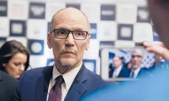  ?? CHRIS CARLSON/AP2019 ?? Then-Democratic National Committee chairman Tom Perez, above, was a guest on a Spanish-language talk radio show in Las Vegas last year when a caller launched into baseless complaints about both parties.