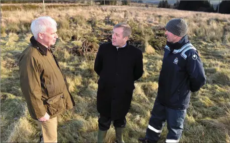  ??  ?? The Minister for Agricultur­e, Food and Marine Micheal Creed TD (centre) with Dr Fergal Monaghaan, project manager Hen Harrier project, and Jack Lynch.