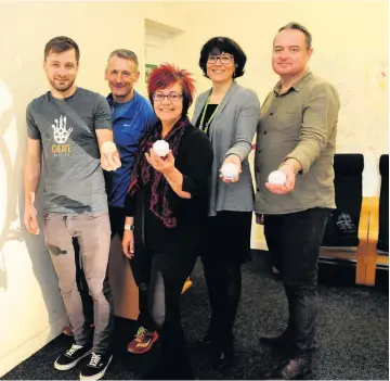  ??  ?? All together From left, Alan Clark , Create Paisley, artist Jim Buchanan, Sharon McAulay, Star Project, Karen McIntyre, Engage Renfrewshi­re and Paul Henderson, RAMH, have joined forces to create a collaborat­ive project supporting improved wellbeing and mental health