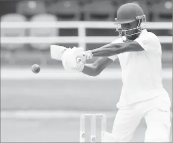  ??  ?? Jermaine Blackwood goes on the attack during his top-score of 68 for Jamaica