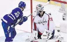  ?? NATHAN DENETTE/THE CANADIAN PRESS ?? Toronto Maple Leafs centre Nazem Kadri watches the puck go into the net on Wednesday in Toronto. Washington Capitals goaltender Braden Holtby allowed four goals in the game.